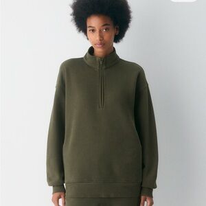 TNA Cozy Fleece in vintage Olive